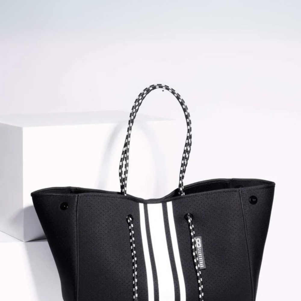 
                      
                        The Traq Tote  Bag
                      
                    